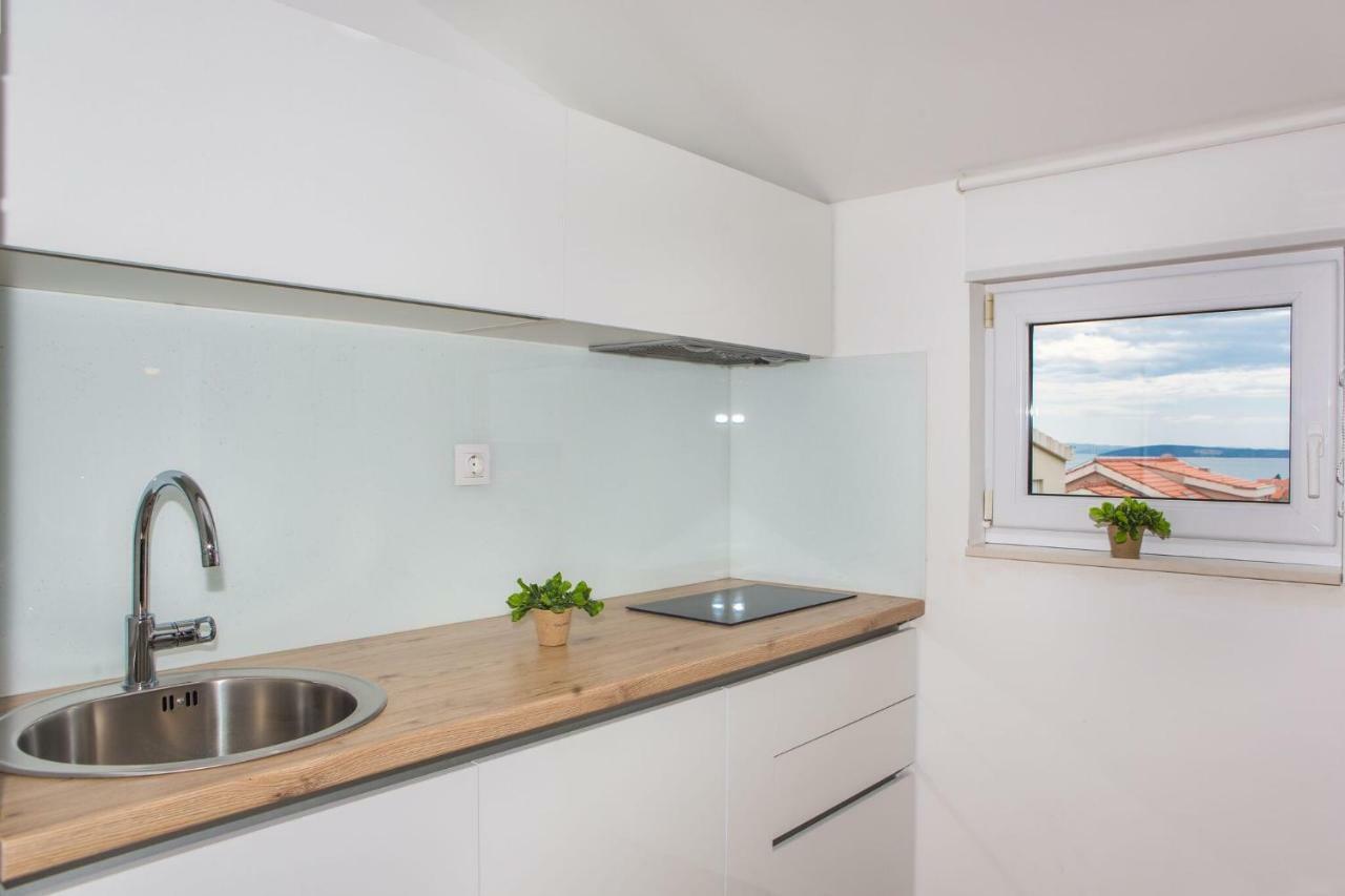Apartmani Ana Каштела Экстерьер фото